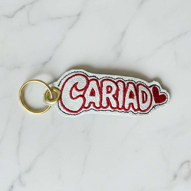 Cariad keyring on white marble