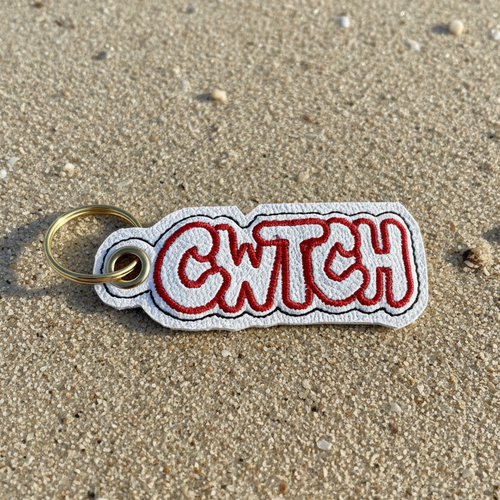 Cwtch Keyring on Sand