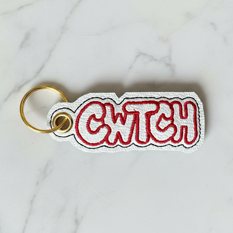 Cwtch keyring on white marble