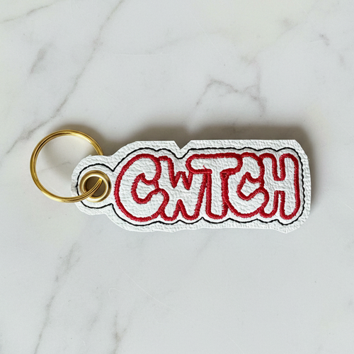 Cwtch keyring on white marble