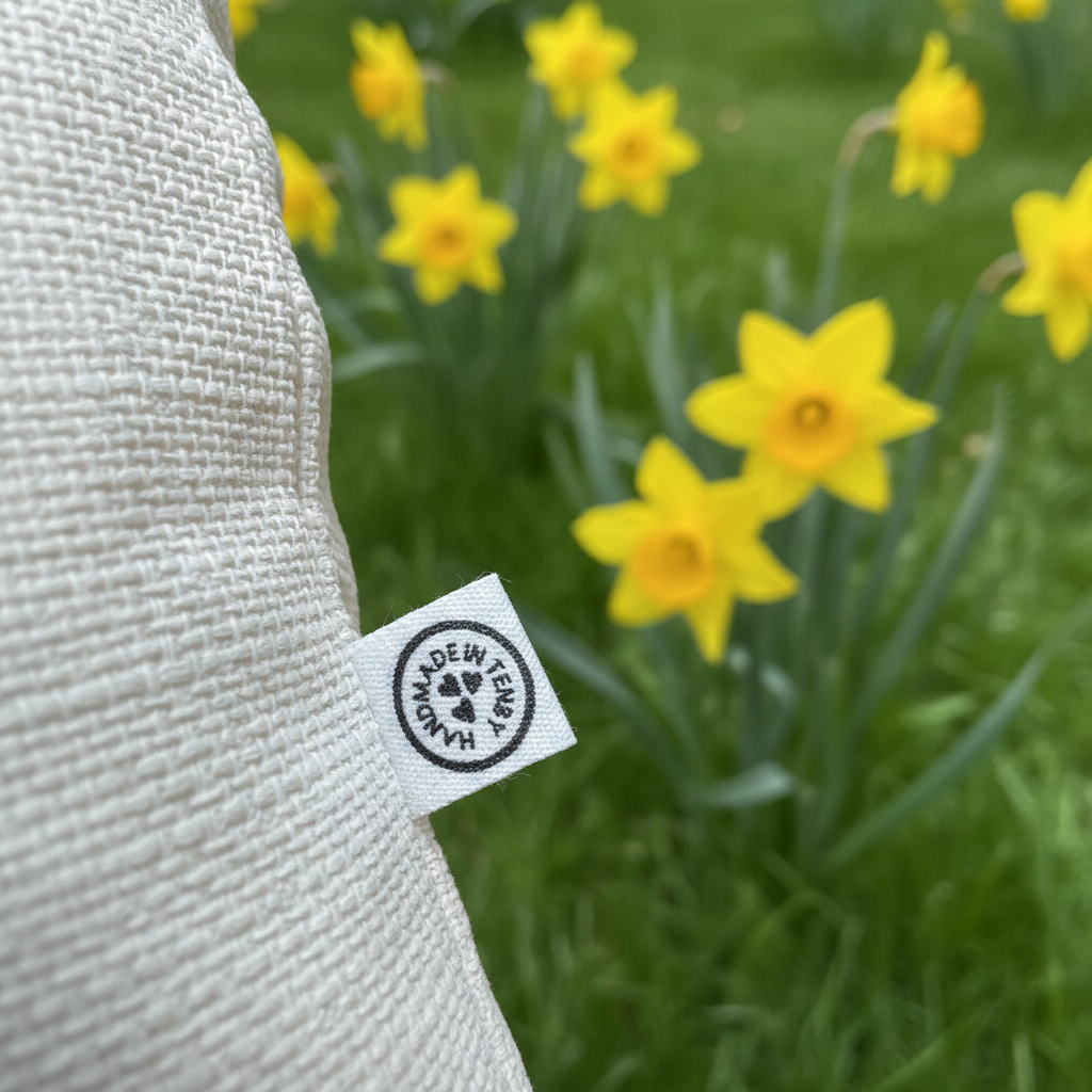 Handmade in Tenby label unchanged with daffodil background
